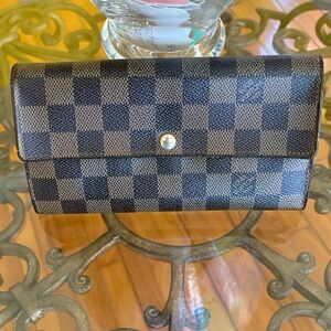 Louis Vuitton Wallet with Button Closure